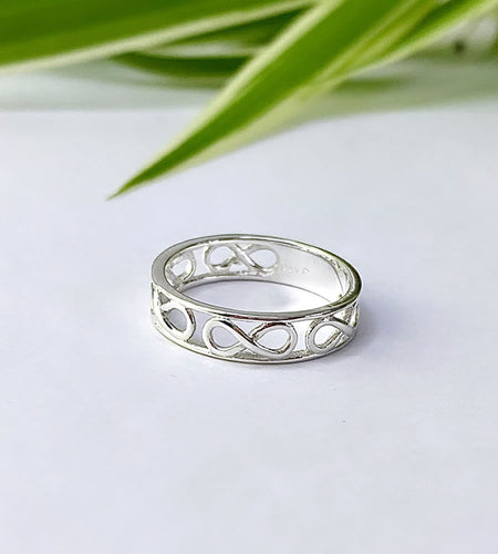 sterling silver ring with smaller infinity symbols