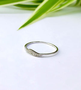 delicate sterling silver wave ring with a hint of sparkle