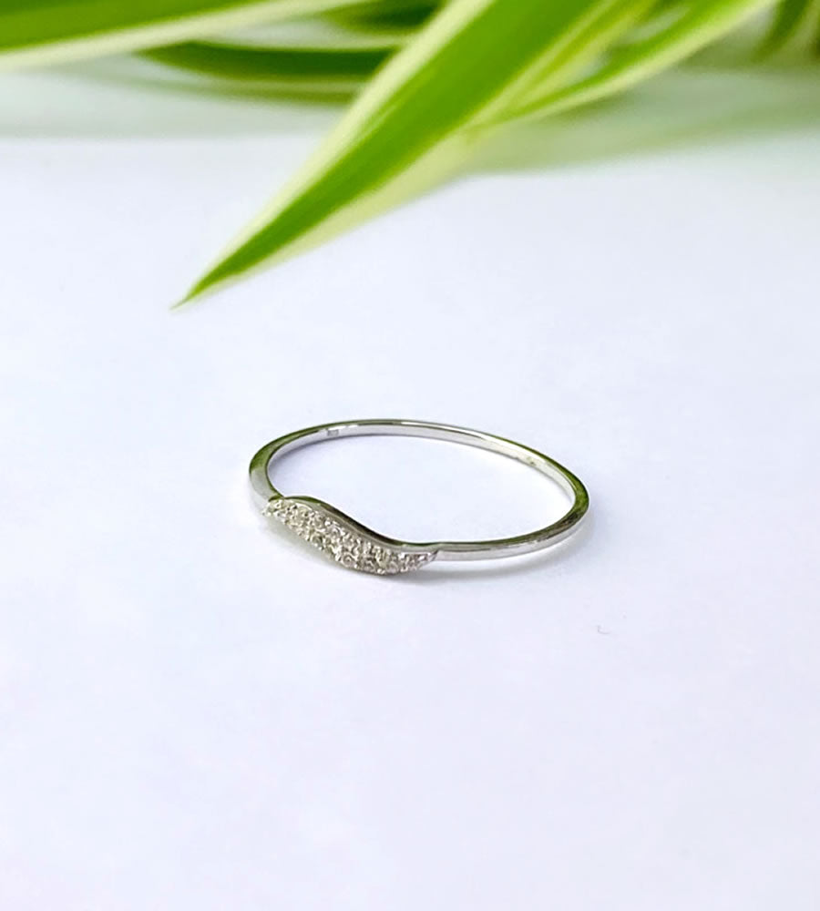 delicate sterling silver wave ring with a hint of sparkle