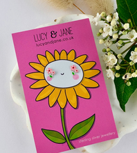Load image into Gallery viewer, sterling silver small pink flower stud earrings on a cheerful sunflower backing card
