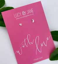 Load image into Gallery viewer, sterling silver mismatched moon and stars studs on a &#39;with love&#39; pink backing card