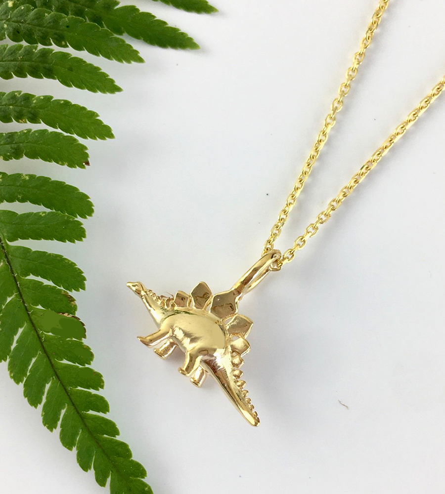 Gold stegosaurus dinosaur necklace