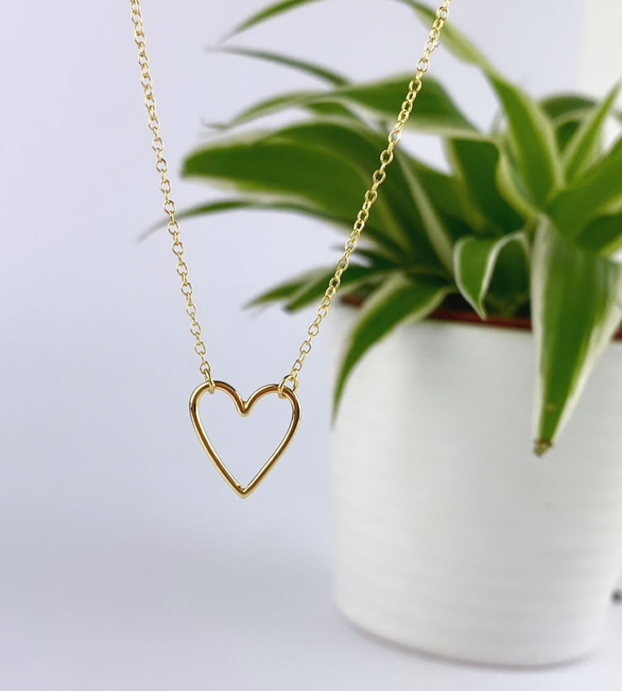 simple gold heart outline necklace