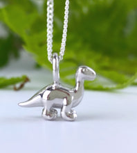 Load image into Gallery viewer, sterling silver mini diplodocus dinosaur necklace