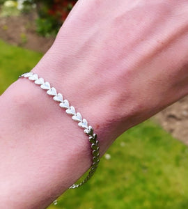 sterling silver hearts bracelet on model