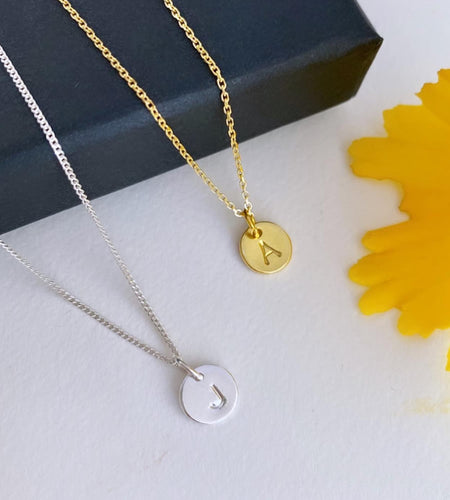 one sterling silver initial necklace with one gold initial necklace - choose what letter you'd like