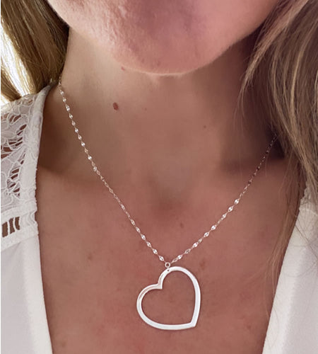 Model photo of sterling silver open heart necklace