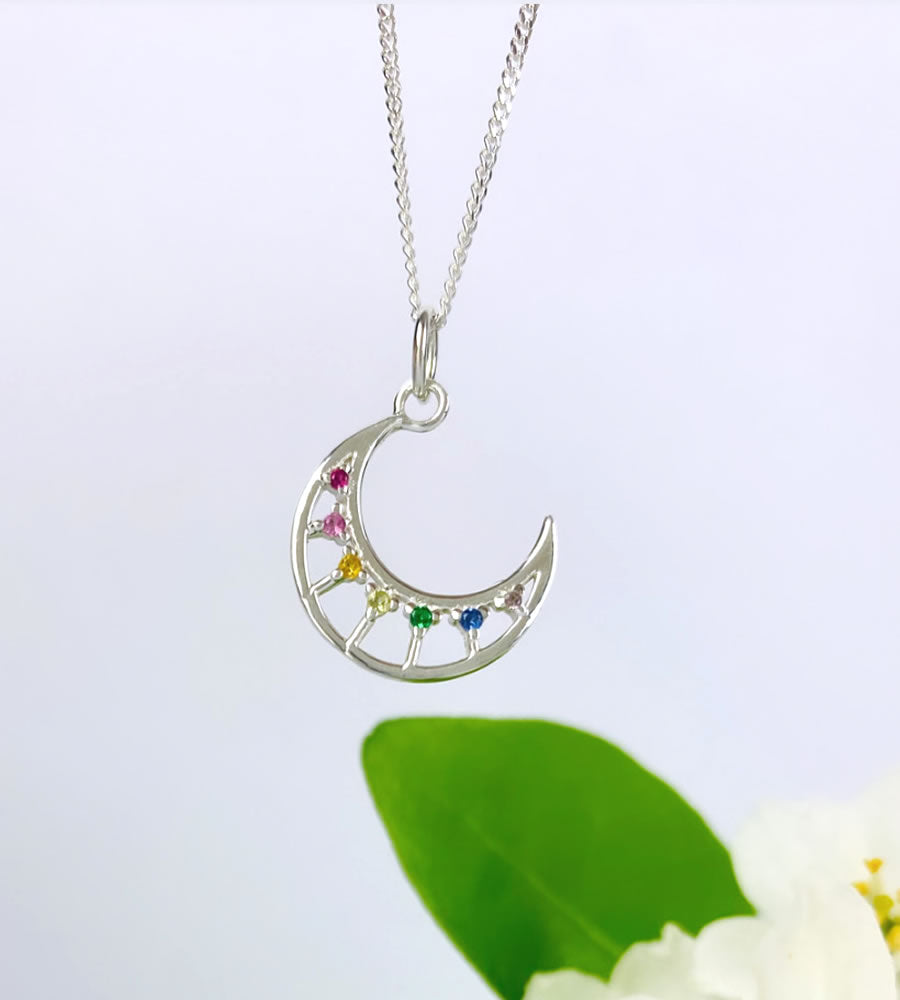 sterling silver crescent moon necklace with rainbow sparkles