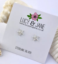 Load image into Gallery viewer, sterling silver starfish studs on a white card