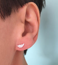 Load image into Gallery viewer, sterling silver small feather studs in model&#39;s ear