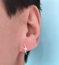 Load image into Gallery viewer, sterling silver lightning bolt stud in model&#39;s ear