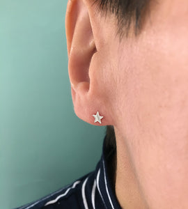 sterling silver star studs worn by a model